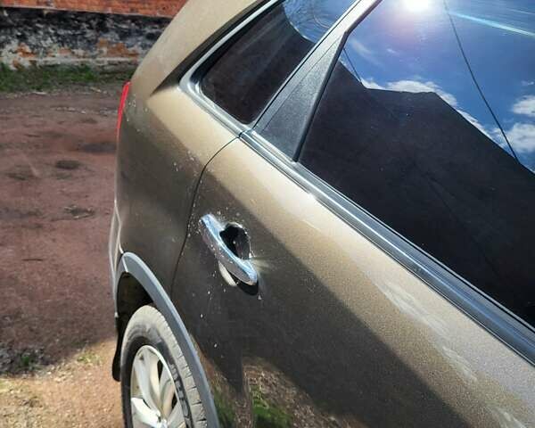 Коричневий Кіа Соренто, об'ємом двигуна 2.2 л та пробігом 205 тис. км за 14000 $, фото 24 на Automoto.ua