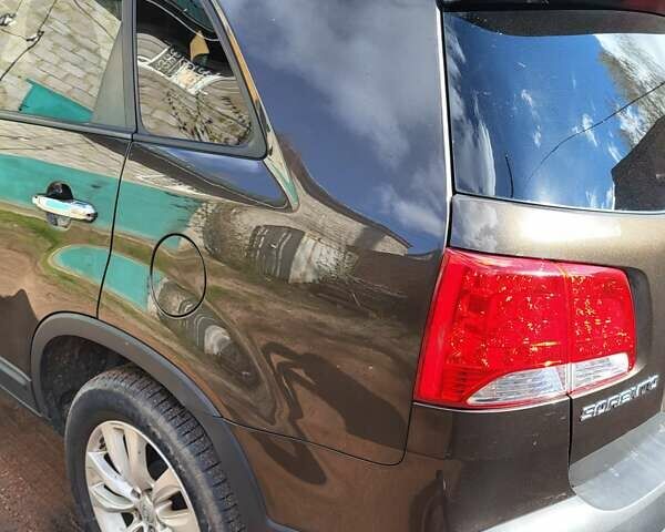 Коричневий Кіа Соренто, об'ємом двигуна 2.2 л та пробігом 205 тис. км за 14000 $, фото 44 на Automoto.ua