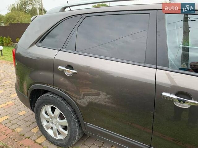 Коричневый Киа Соренто, объемом двигателя 2 л и пробегом 240 тыс. км за 13600 $, фото 19 на Automoto.ua