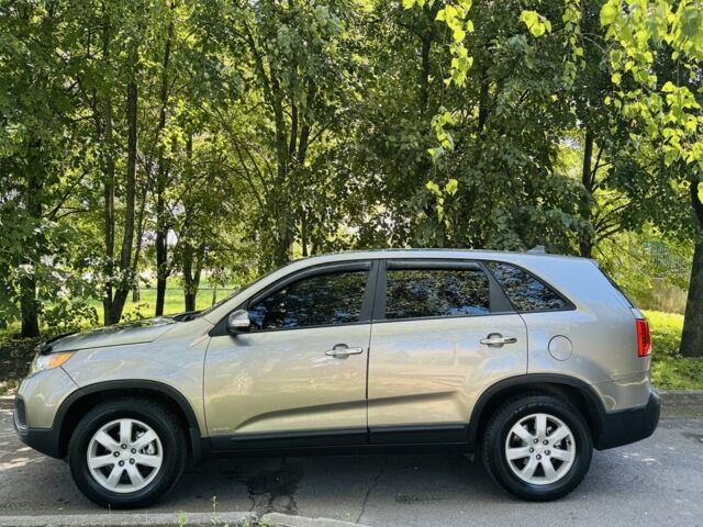 Коричневый Киа Соренто, объемом двигателя 2.4 л и пробегом 93 тыс. км за 12800 $, фото 1 на Automoto.ua