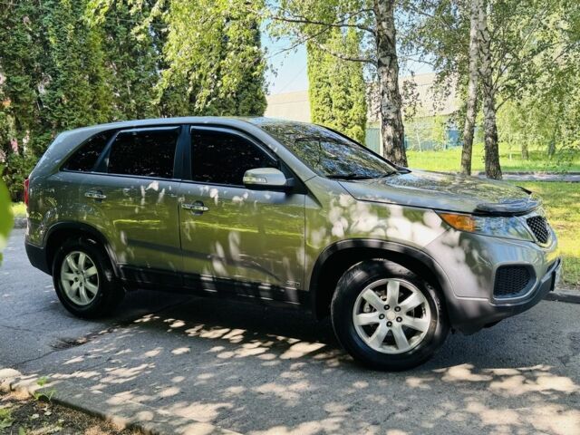 Коричневый Киа Соренто, объемом двигателя 2.4 л и пробегом 93 тыс. км за 12800 $, фото 4 на Automoto.ua