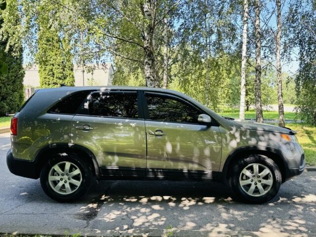 Коричневый Киа Соренто, объемом двигателя 2.4 л и пробегом 93 тыс. км за 12800 $, фото 5 на Automoto.ua