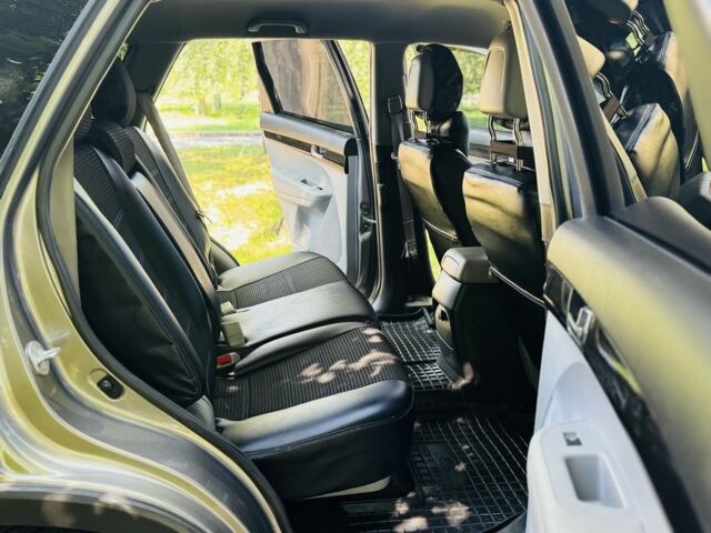 Коричневый Киа Соренто, объемом двигателя 2.4 л и пробегом 93 тыс. км за 12800 $, фото 12 на Automoto.ua