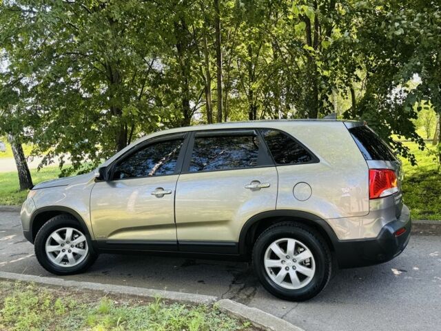 Коричневый Киа Соренто, объемом двигателя 2.4 л и пробегом 93 тыс. км за 12800 $, фото 2 на Automoto.ua