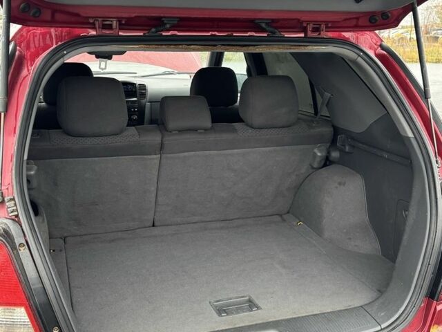 Красный Киа Соренто, объемом двигателя 2.5 л и пробегом 282 тыс. км за 3300 $, фото 9 на Automoto.ua