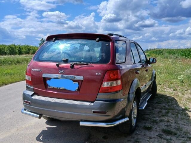 Красный Киа Соренто, объемом двигателя 2 л и пробегом 370 тыс. км за 2700 $, фото 3 на Automoto.ua