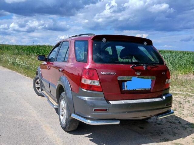Красный Киа Соренто, объемом двигателя 2 л и пробегом 370 тыс. км за 2700 $, фото 2 на Automoto.ua