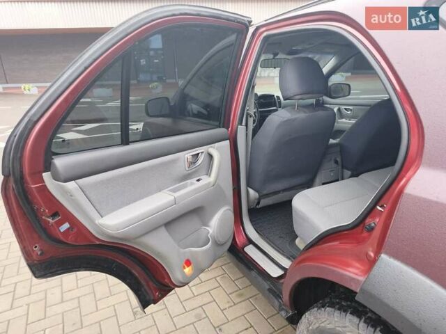 Красный Киа Соренто, объемом двигателя 2.5 л и пробегом 308 тыс. км за 7500 $, фото 4 на Automoto.ua