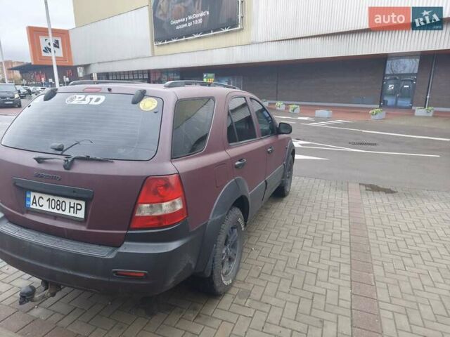 Красный Киа Соренто, объемом двигателя 2.5 л и пробегом 308 тыс. км за 7500 $, фото 2 на Automoto.ua