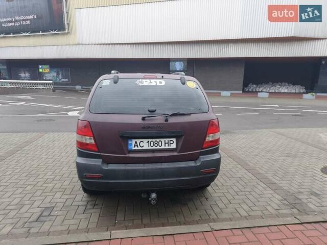 Красный Киа Соренто, объемом двигателя 2.5 л и пробегом 308 тыс. км за 7500 $, фото 8 на Automoto.ua