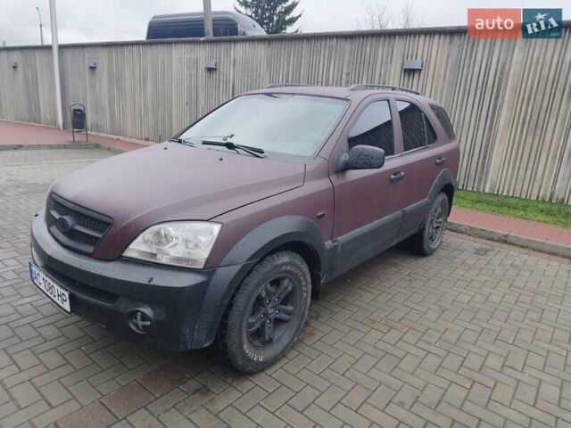 Красный Киа Соренто, объемом двигателя 2.5 л и пробегом 308 тыс. км за 7500 $, фото 1 на Automoto.ua