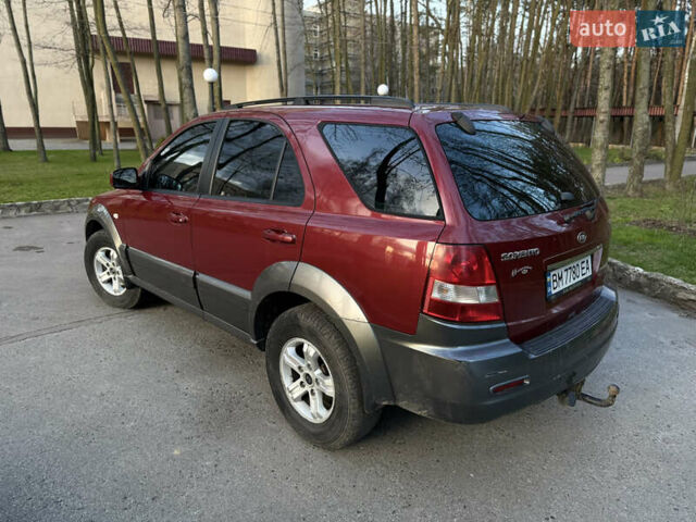 Красный Киа Соренто, объемом двигателя 2.5 л и пробегом 256 тыс. км за 8200 $, фото 5 на Automoto.ua
