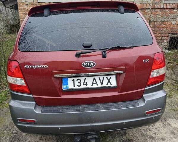 Красный Киа Соренто, объемом двигателя 2.5 л и пробегом 189 тыс. км за 4000 $, фото 1 на Automoto.ua