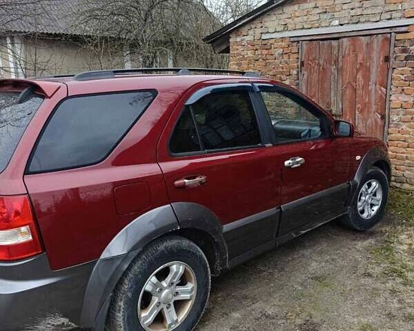 Красный Киа Соренто, объемом двигателя 2.5 л и пробегом 189 тыс. км за 4000 $, фото 2 на Automoto.ua