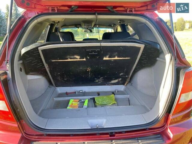 Красный Киа Соренто, объемом двигателя 2.4 л и пробегом 282 тыс. км за 6500 $, фото 24 на Automoto.ua