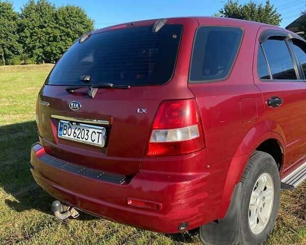 Красный Киа Соренто, объемом двигателя 2.4 л и пробегом 282 тыс. км за 6500 $, фото 7 на Automoto.ua