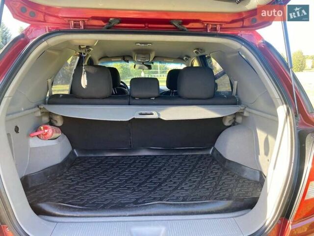 Красный Киа Соренто, объемом двигателя 2.4 л и пробегом 282 тыс. км за 6500 $, фото 23 на Automoto.ua