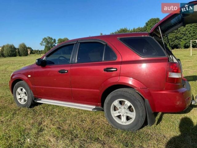 Красный Киа Соренто, объемом двигателя 2.4 л и пробегом 282 тыс. км за 6500 $, фото 5 на Automoto.ua