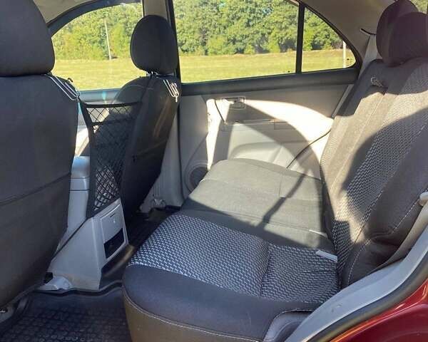 Красный Киа Соренто, объемом двигателя 2.4 л и пробегом 282 тыс. км за 6500 $, фото 19 на Automoto.ua