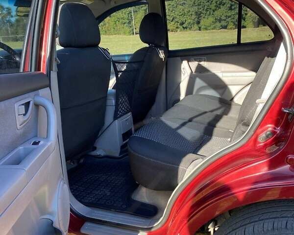 Красный Киа Соренто, объемом двигателя 2.4 л и пробегом 282 тыс. км за 6500 $, фото 18 на Automoto.ua