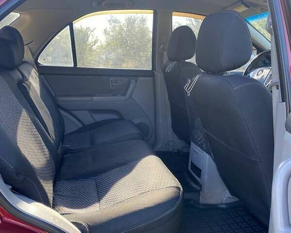 Красный Киа Соренто, объемом двигателя 2.4 л и пробегом 282 тыс. км за 6500 $, фото 17 на Automoto.ua