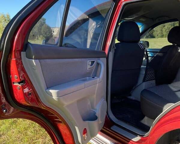 Красный Киа Соренто, объемом двигателя 2.4 л и пробегом 282 тыс. км за 6500 $, фото 11 на Automoto.ua