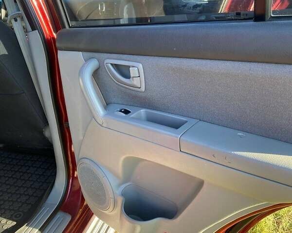 Красный Киа Соренто, объемом двигателя 2.4 л и пробегом 282 тыс. км за 6500 $, фото 10 на Automoto.ua