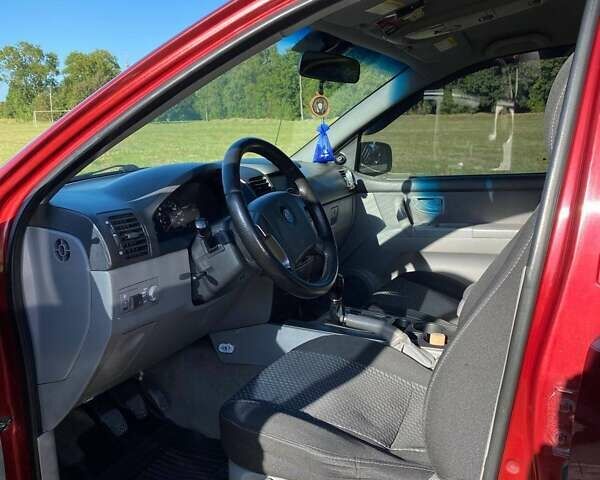 Красный Киа Соренто, объемом двигателя 2.4 л и пробегом 282 тыс. км за 6500 $, фото 13 на Automoto.ua