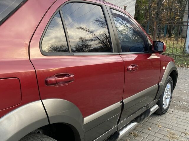 Красный Киа Соренто, объемом двигателя 2.5 л и пробегом 200 тыс. км за 3150 $, фото 11 на Automoto.ua