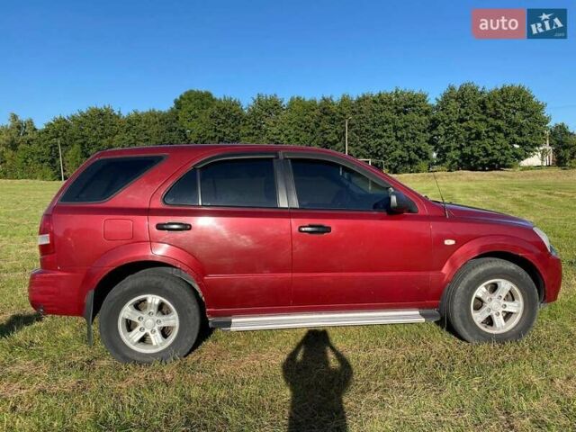 Красный Киа Соренто, объемом двигателя 2.4 л и пробегом 282 тыс. км за 6500 $, фото 2 на Automoto.ua