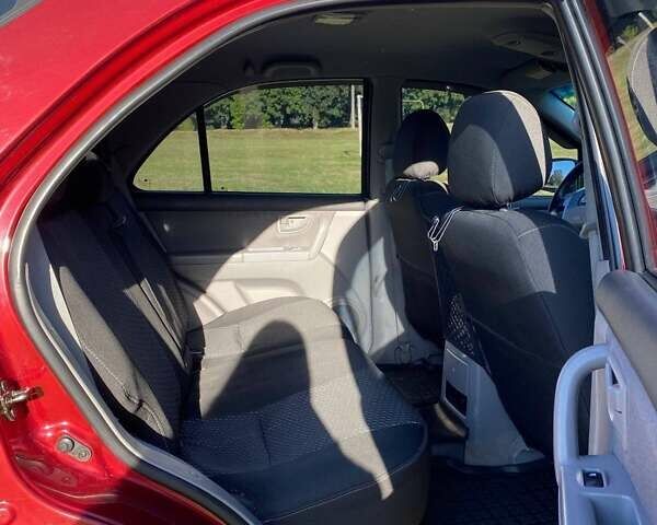 Красный Киа Соренто, объемом двигателя 2.4 л и пробегом 282 тыс. км за 6500 $, фото 16 на Automoto.ua