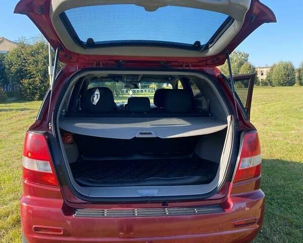 Красный Киа Соренто, объемом двигателя 2.4 л и пробегом 282 тыс. км за 6500 $, фото 22 на Automoto.ua