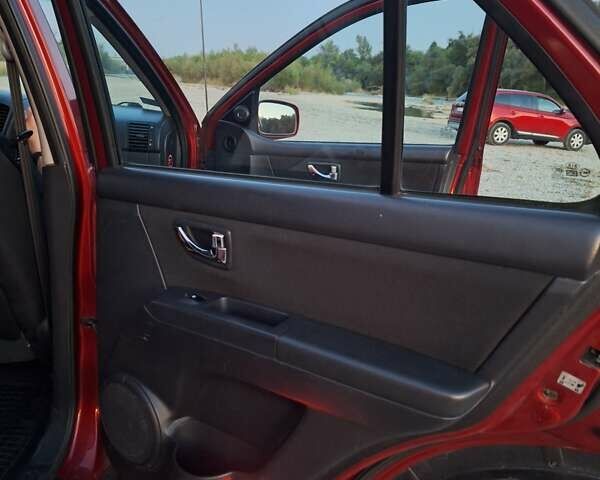 Красный Киа Соренто, объемом двигателя 2.5 л и пробегом 234 тыс. км за 9300 $, фото 12 на Automoto.ua