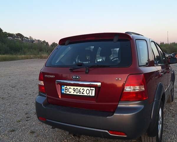 Красный Киа Соренто, объемом двигателя 2.5 л и пробегом 234 тыс. км за 9300 $, фото 3 на Automoto.ua