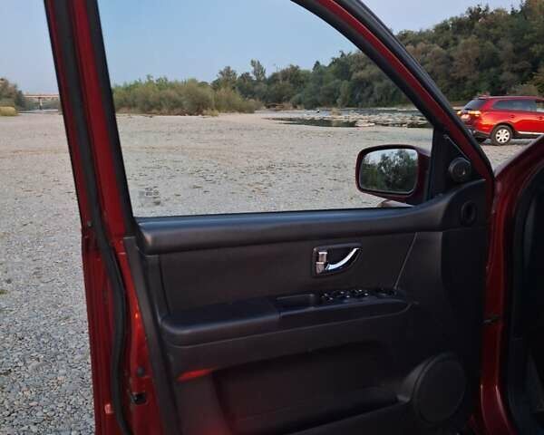 Красный Киа Соренто, объемом двигателя 2.5 л и пробегом 234 тыс. км за 9300 $, фото 10 на Automoto.ua
