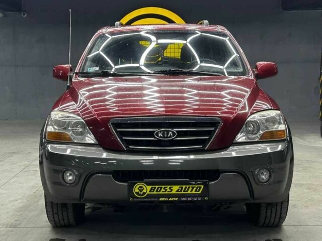 Красный Киа Соренто, объемом двигателя 2.5 л и пробегом 234 тыс. км за 9400 $, фото 1 на Automoto.ua