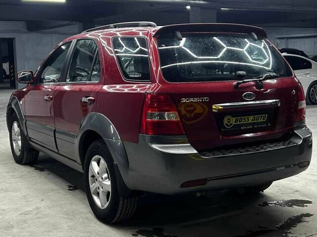 Красный Киа Соренто, объемом двигателя 2.5 л и пробегом 234 тыс. км за 9400 $, фото 3 на Automoto.ua