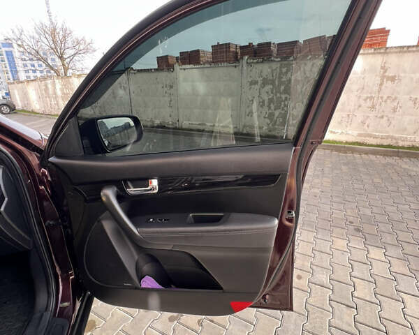 Красный Киа Соренто, объемом двигателя 2.36 л и пробегом 190 тыс. км за 11300 $, фото 49 на Automoto.ua