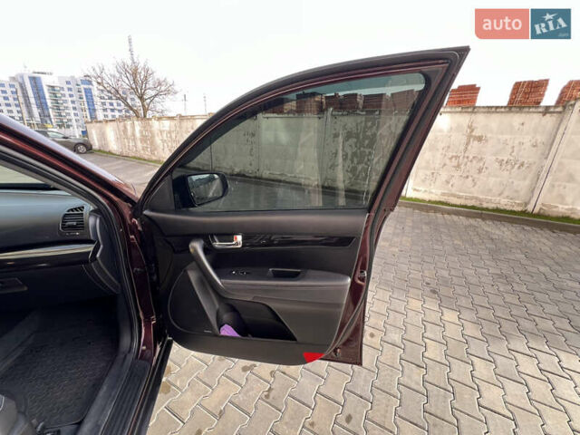 Красный Киа Соренто, объемом двигателя 2.36 л и пробегом 190 тыс. км за 11300 $, фото 48 на Automoto.ua