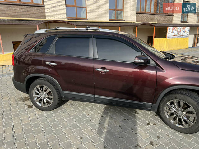 Красный Киа Соренто, объемом двигателя 2.36 л и пробегом 190 тыс. км за 11300 $, фото 7 на Automoto.ua