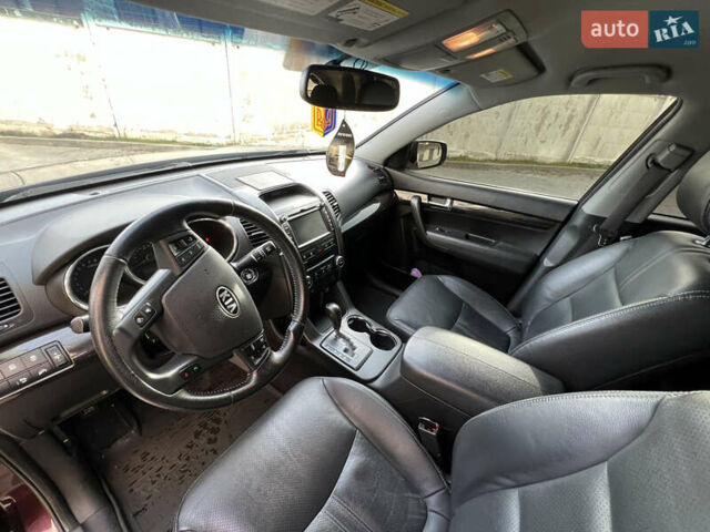 Красный Киа Соренто, объемом двигателя 2.36 л и пробегом 190 тыс. км за 11300 $, фото 38 на Automoto.ua