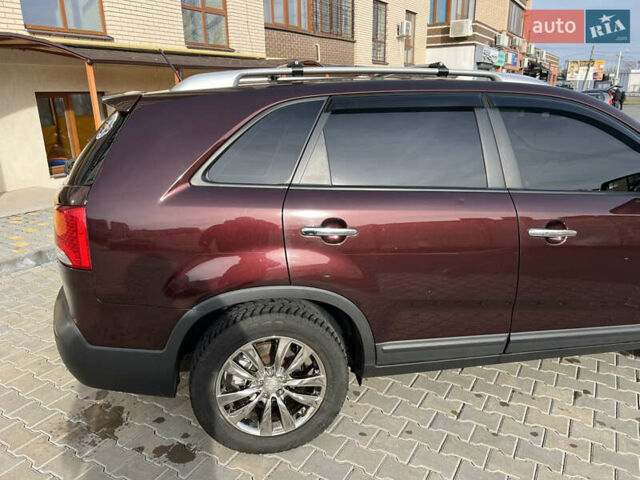 Красный Киа Соренто, объемом двигателя 2.36 л и пробегом 190 тыс. км за 11300 $, фото 9 на Automoto.ua
