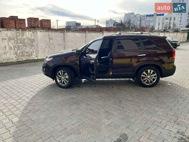 Красный Киа Соренто, объемом двигателя 2.36 л и пробегом 190 тыс. км за 11300 $, фото 56 на Automoto.ua