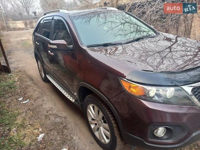 Красный Киа Соренто, объемом двигателя 2.4 л и пробегом 179 тыс. км за 12600 $, фото 3 на Automoto.ua