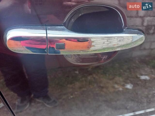 Красный Киа Соренто, объемом двигателя 2.4 л и пробегом 179 тыс. км за 12600 $, фото 18 на Automoto.ua