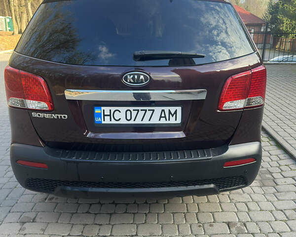 Червоний Кіа Соренто, об'ємом двигуна 2.36 л та пробігом 249 тис. км за 9999 $, фото 5 на Automoto.ua