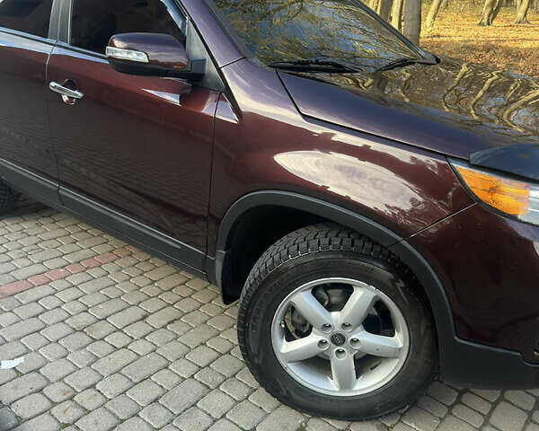 Червоний Кіа Соренто, об'ємом двигуна 2.36 л та пробігом 249 тис. км за 9999 $, фото 2 на Automoto.ua