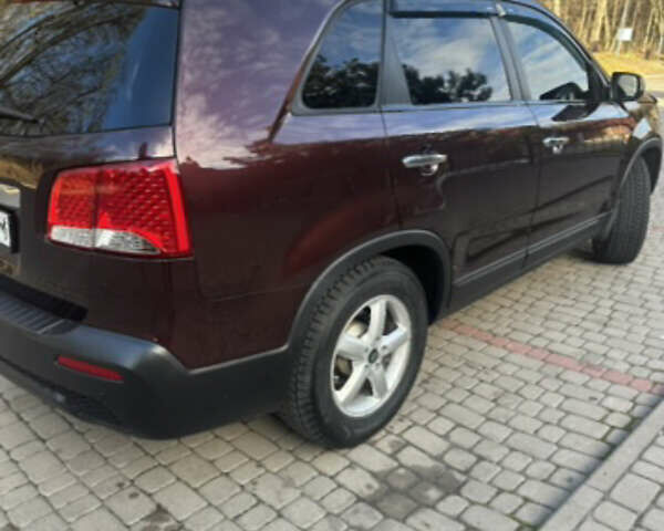 Червоний Кіа Соренто, об'ємом двигуна 2.36 л та пробігом 249 тис. км за 9999 $, фото 4 на Automoto.ua