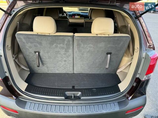 Красный Киа Соренто, объемом двигателя 2.35 л и пробегом 169 тыс. км за 14000 $, фото 23 на Automoto.ua