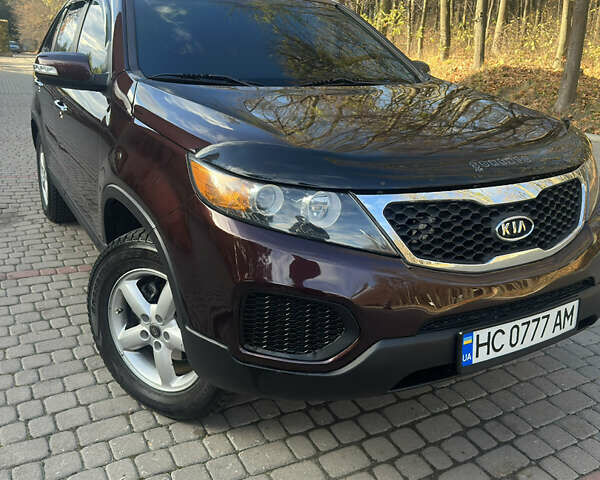 Червоний Кіа Соренто, об'ємом двигуна 2.36 л та пробігом 249 тис. км за 9999 $, фото 1 на Automoto.ua